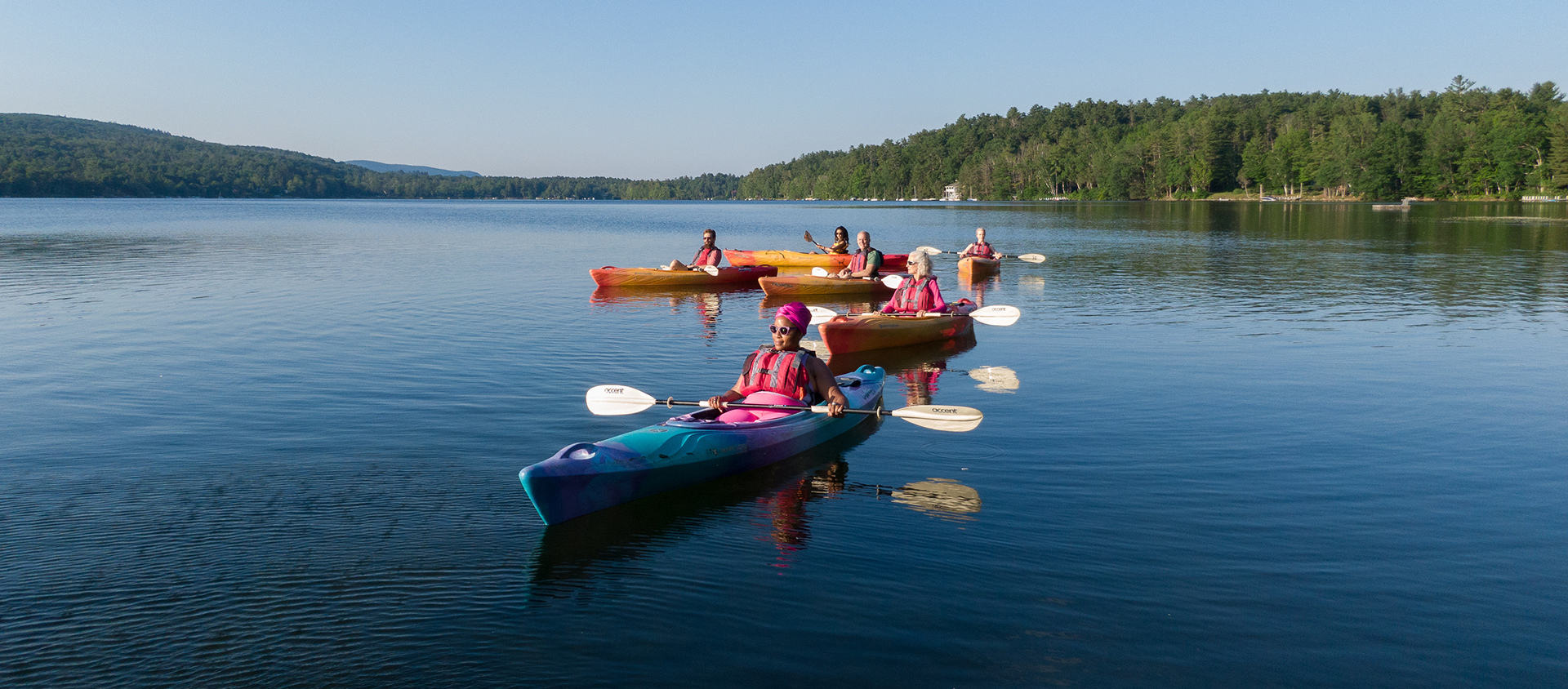 Guests Kayaking in the lake