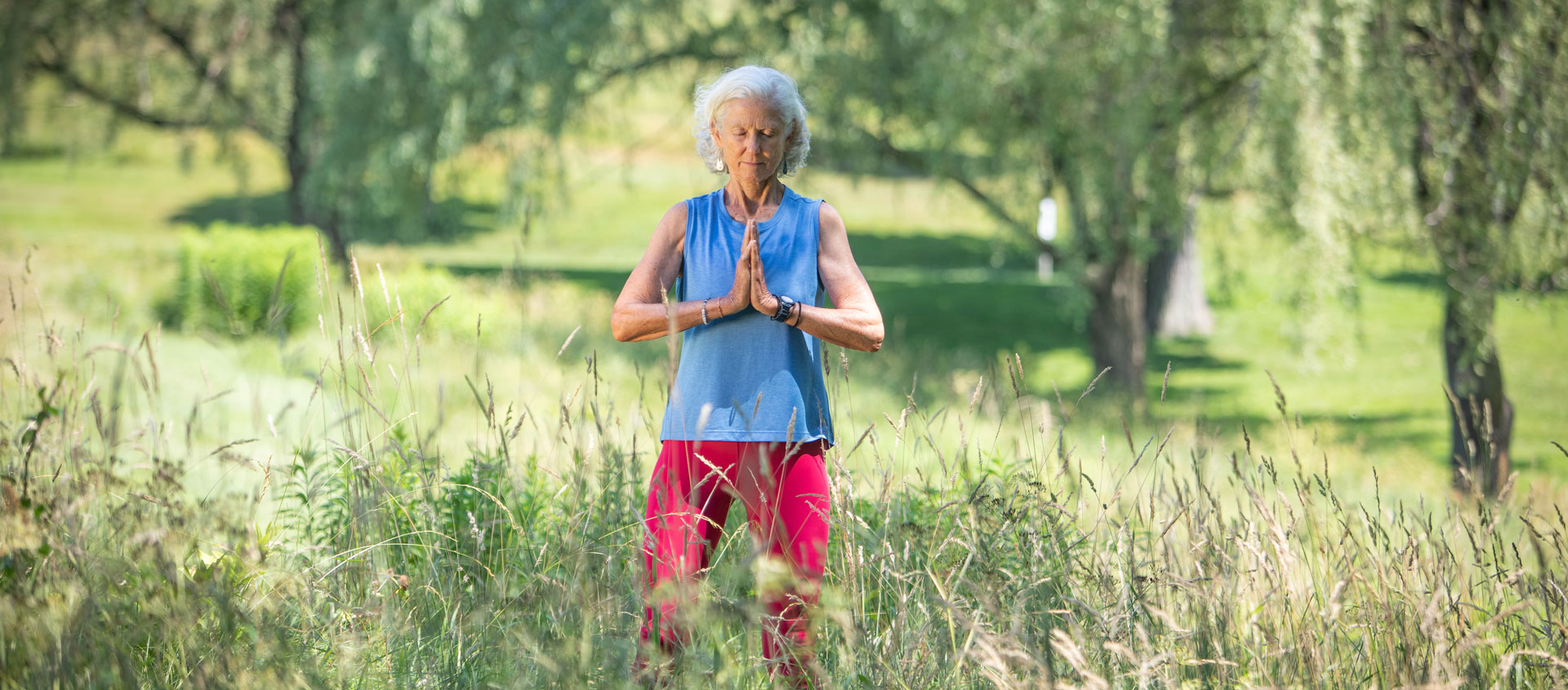 woman with hands at heart