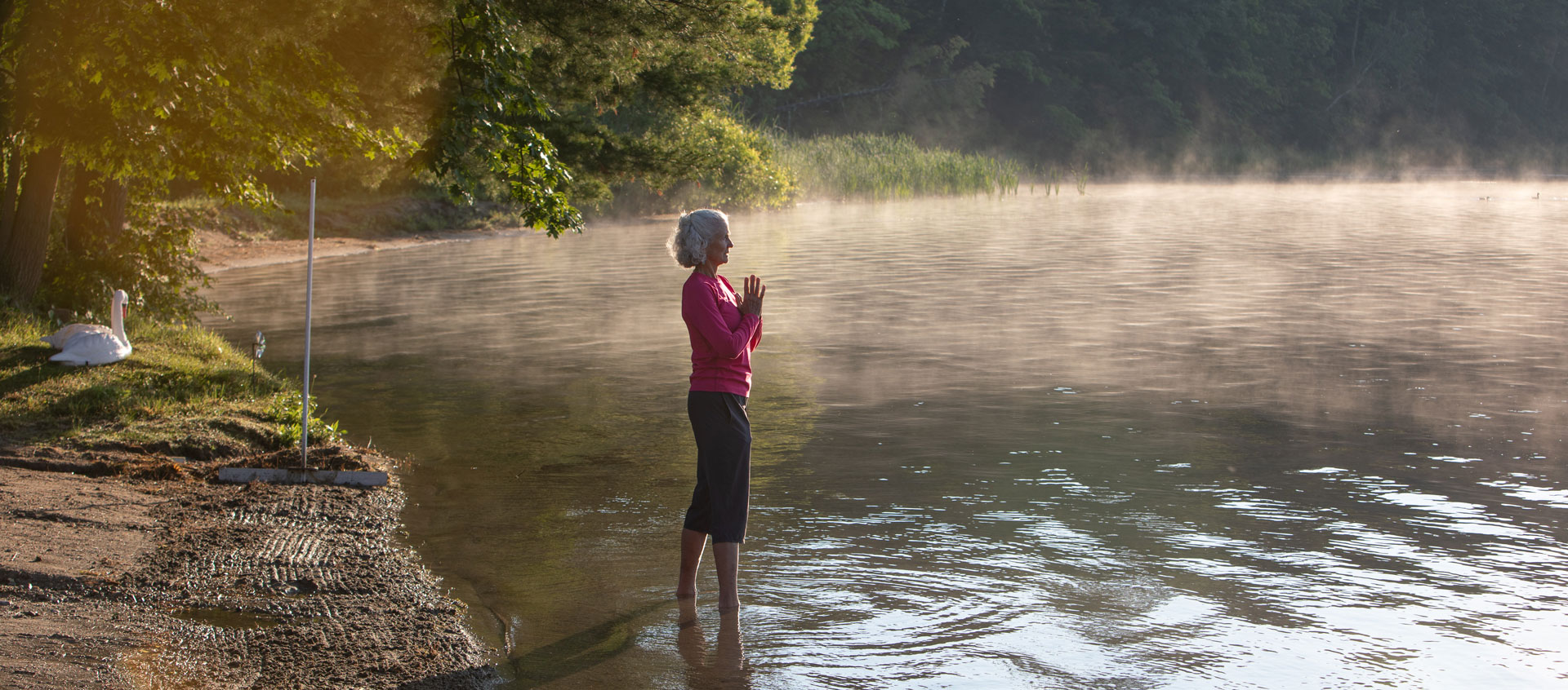 woman standing in lake