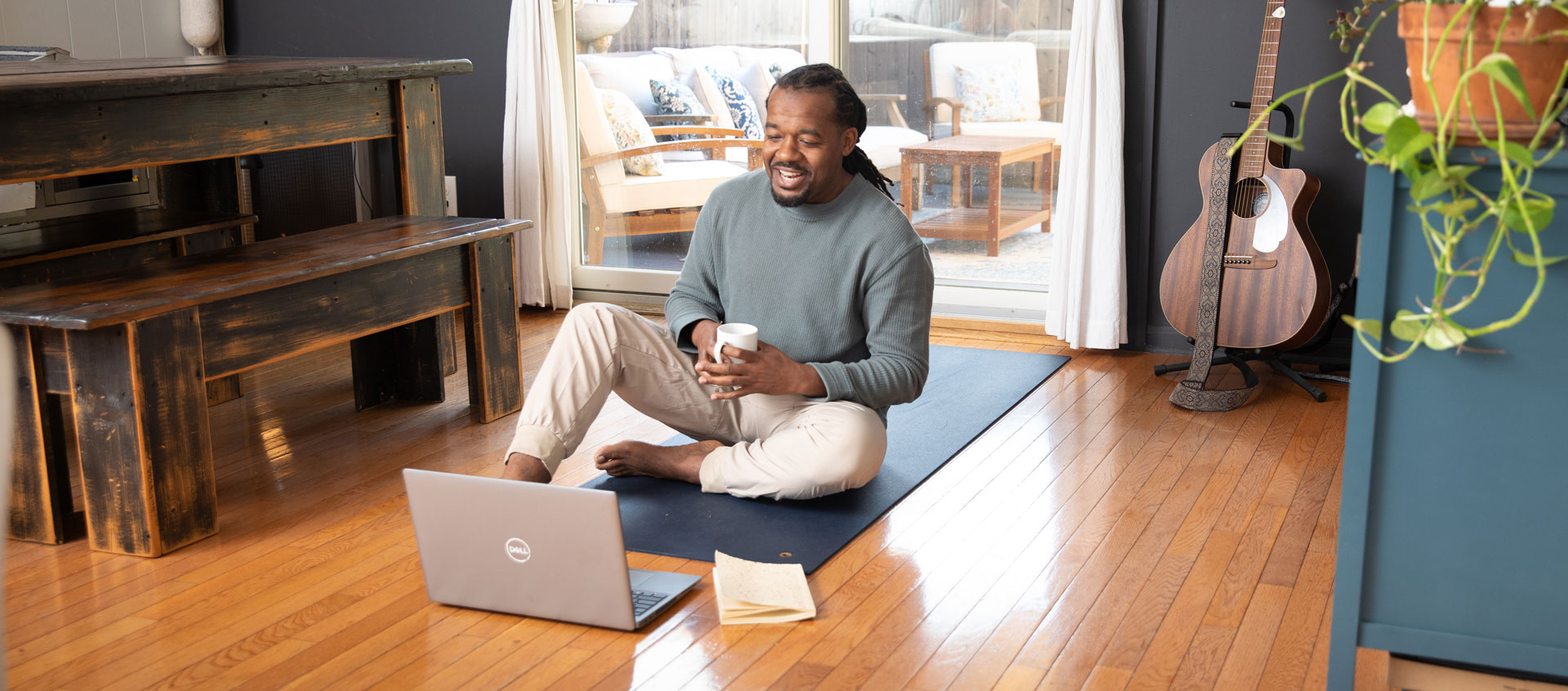 man looking at laptop