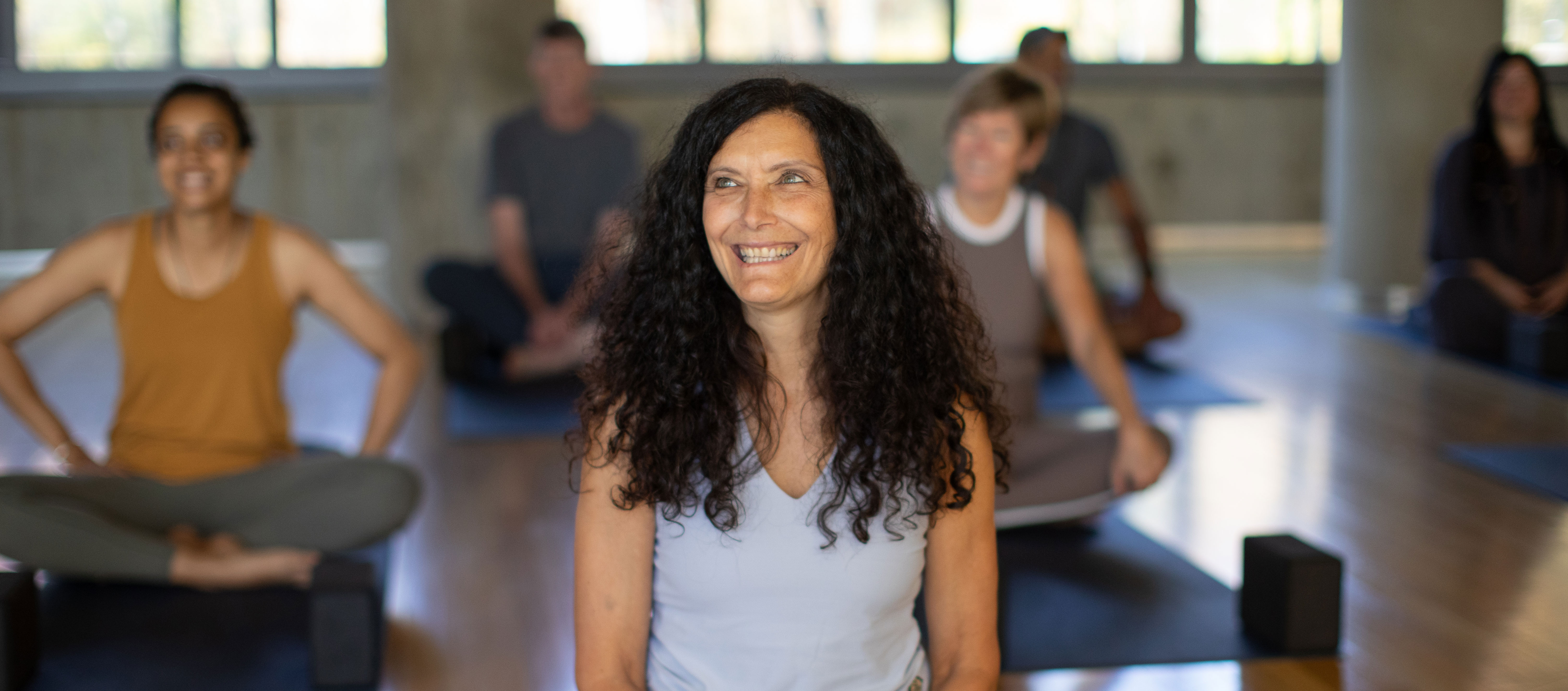 yoga students smiling in class